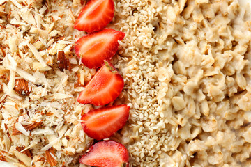 Tasty sweet oatmeal with strawberry, closeup