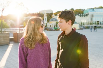 Outdoor portrait of couple young boy and girl