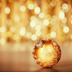 Christmas decoration on abstract gold background, close up