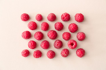 Sweet ripe raspberry on light background