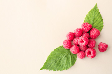 Sweet ripe raspberry on light background