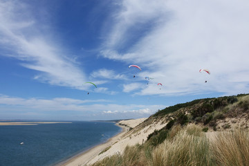 France. Parasailing of the Dunes du PIlat at the Atlantique coast