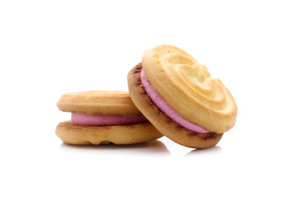 sandwich cookies with strawberry cream on white background
