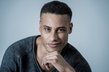 Fashion portrait of Attractive african american male model posing happy and sexy for the camera
