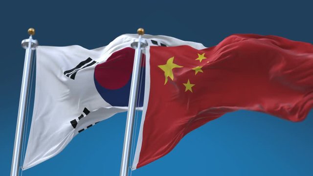 4k Seamless South Korea and China Flags with blue sky background;A fully digital rendering;The animation loops at 20 seconds;ROK CHN CN.
