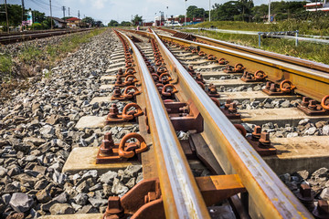 Two railway tracks merge together.