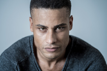 Fashion portrait of Attractive african american male model posing happy and sexy for the camera
