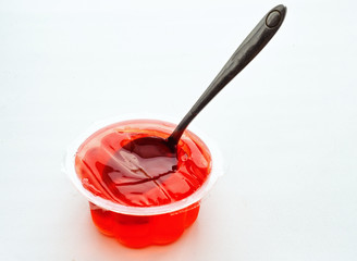 fruit jelly red with a spoon