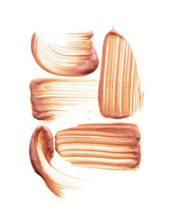 Gently beige strokes and texture of face highlighter or acrylic paint isolated on white background