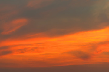 Obraz premium Orange and yellow sky.sky after sunset or sunrise background.