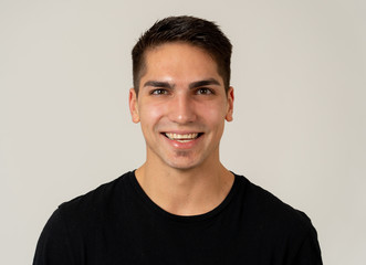 Portrait of attractive cheerful young man with smiling happy face. Human expressions and emotions