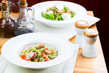 A fresh bowl of homemade coleslaw with dressing