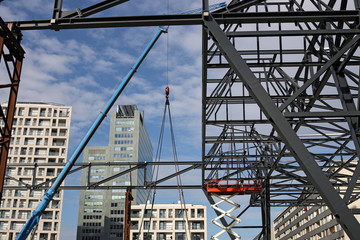 Construction site with workers and crane Donau city Vienna Austria