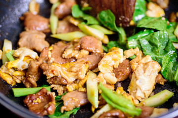 Thai food cooking, stir fried rice noodle in soy sauce (Pad See Ew)