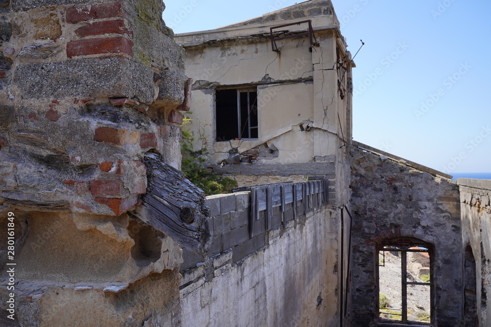 Wall mural lost places with abandoned and destroyed building in argintiera, in sardinia (italy)