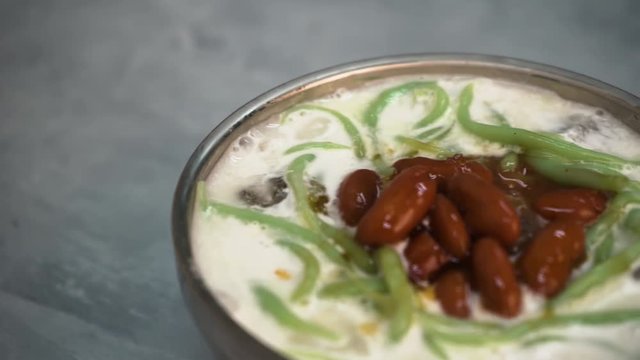Cendol , Malaysia tradition dessert with slate background