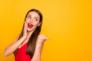 Photo of excited lady bright look indicating fingers empty space advising unbelievable sale...