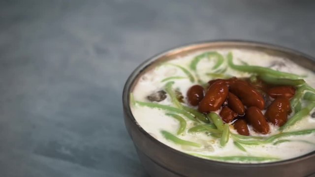 Cendol , Malaysia tradition dessert with slate background