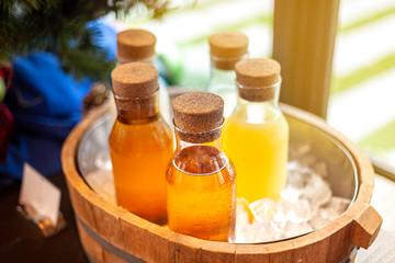Fototapeta na wymiar Natural orange juice in bottles Chilled, ready to drink