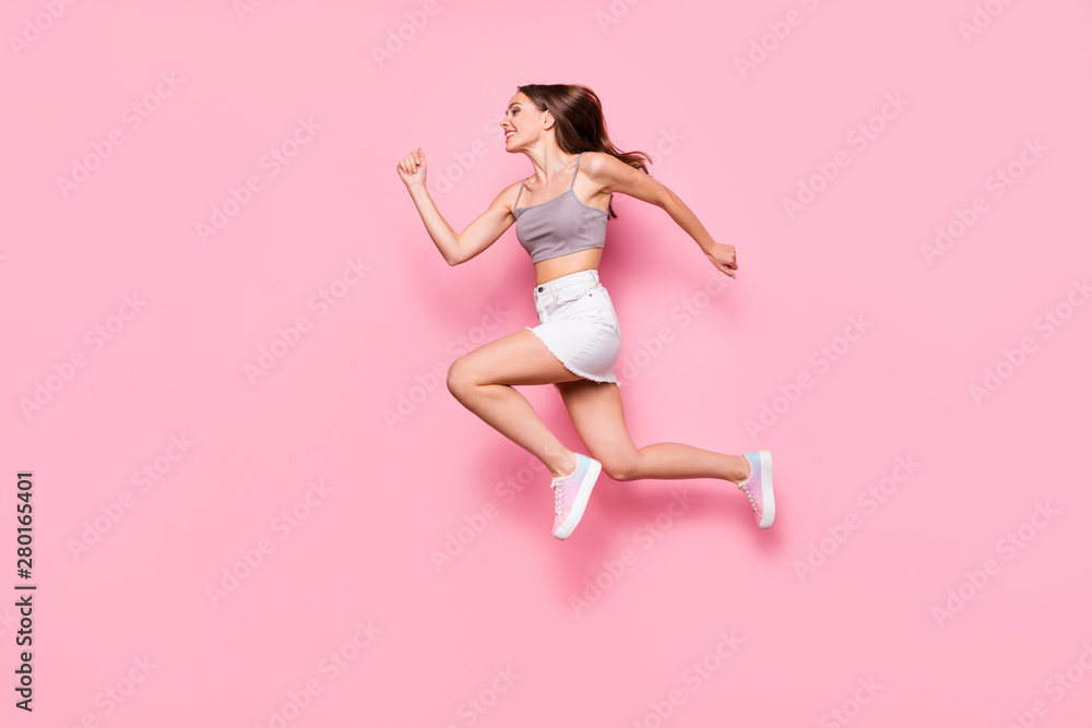 Sticker Profile side full body photo of pretty girl running wearing gray tank-top white skirt isolated over pink background