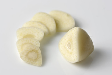 garlic slices isolated on white background