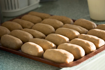 Raw big dumplings made from grated potatoes, Cepelinai © ffolas