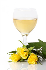 glass of white wine and rose on white background