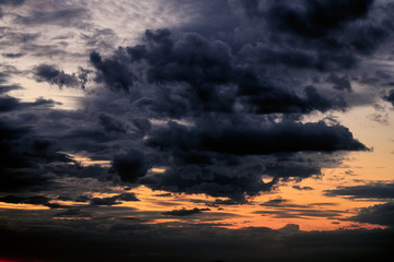 Fototapeta na wymiar Beautiful sunset - dark sky with clouds and sunlight