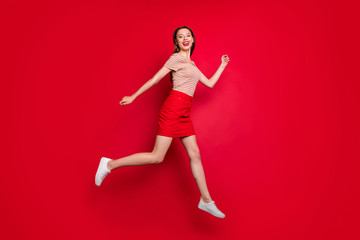 Fototapeta na wymiar Full length body size photo of pretty cheerful excited lady hurrying up for sales on black friday isolated bright background