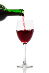Pouring Red Wine. Isolated with clipping path. 