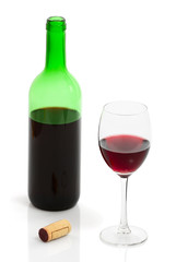 bottle and glass of red wine isolated with clipping path