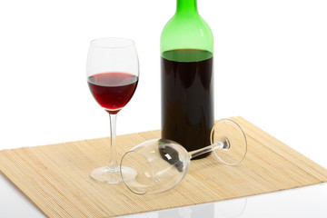 bottle and glass of red wine isolated with clipping path