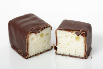 soft chocolate-covered candy filled with soft meringue