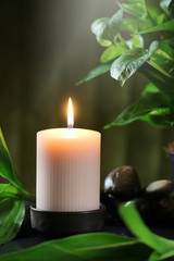 Close up candle on table and spa concept background.