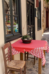 The tables and chairs of a street cafe-restaurant