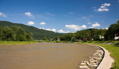 River Poprad in summer. Piwniczna-Zdroj, Poland.