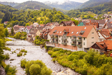 Fototapeta na wymiar The German town of Forbach in the Murg river. Black forest. Germany.