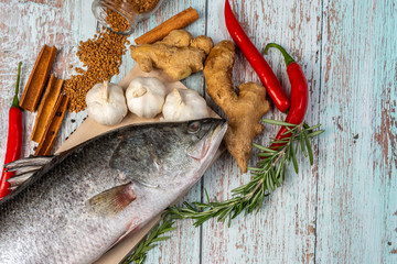 Fresh Sea Bass on wooden table