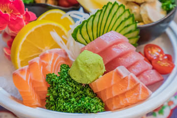 Salmon raw sashimi sushi with shrimp on plate, japanese food