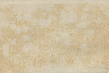 Vintage and old looking paper background. Retro cardboard texture. Grunge paper for drawing. Ancient book page.