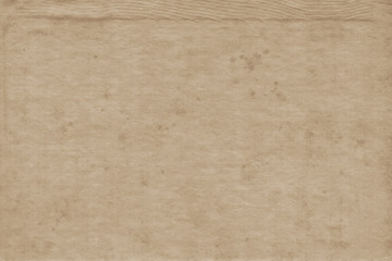 Vintage and old looking paper background. Retro cardboard texture. Grunge paper for drawing. Ancient book page.