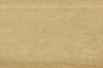 Vintage and old looking paper background. Retro cardboard texture. Grunge paper for drawing. Ancient book page.