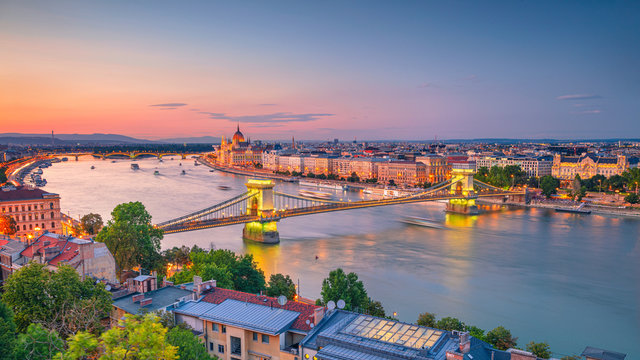 Budapest, Hungary. Aerial cityscape image of Budapest panorama with Chain Bridge and parliament building during summer sunset.	