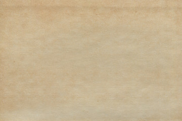 Vintage and old looking paper background. Retro cardboard texture. Grunge paper for drawing. Ancient book page.