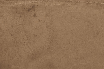 Vintage and old looking paper background. Retro cardboard texture. Grunge paper for drawing. Ancient book page.