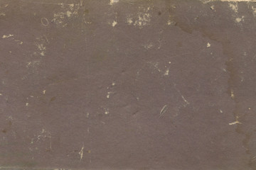 Vintage and old looking paper background. Retro cardboard texture. Grunge paper for drawing. Ancient book page.