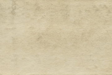 Vintage and old looking paper background. Retro cardboard texture. Grunge paper for drawing. Ancient book page.