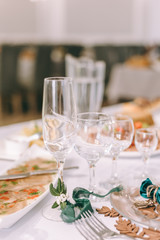 Empty glasses set in restaurant. Part of interior