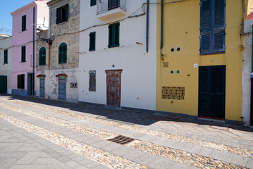 Row of colourful houses along the promenade in Alghero in Sardinia