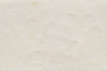 Vintage and old looking paper background. Retro cardboard texture. Grunge paper for drawing. Ancient book page.